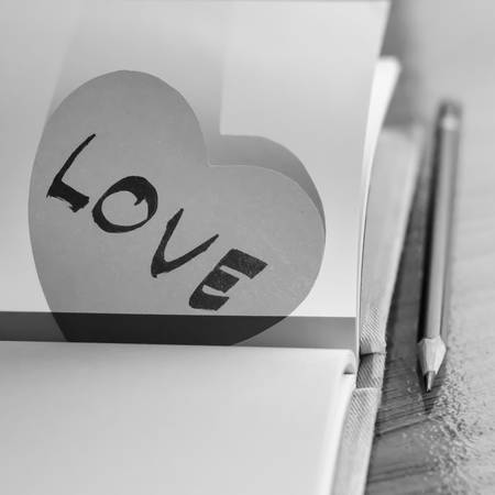 black and white paper heart write love word wordの写真素材