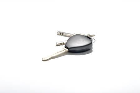 keys and car key isolated on white backgroundの写真素材