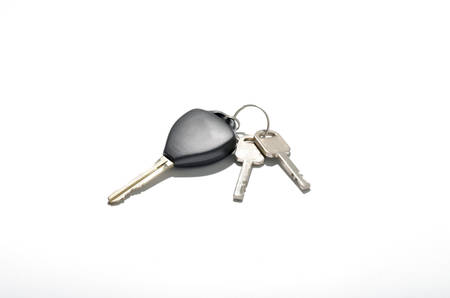keys and car key isolated on white backgroundの写真素材