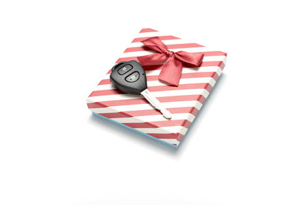 car key and gift box isolated on white background