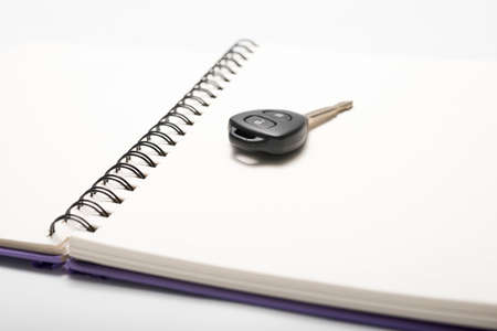 car key on notebook paperの写真素材