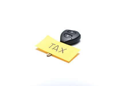 car key tag tax isolated on white background concept pay car tax