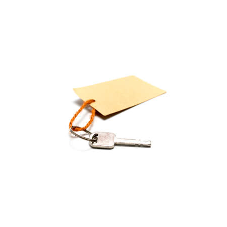 key with tag isolated on white backgroundの写真素材