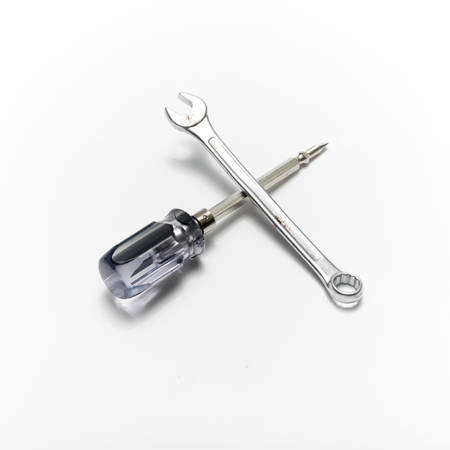 screwdriver and wrench isolated on white backgroundの写真素材