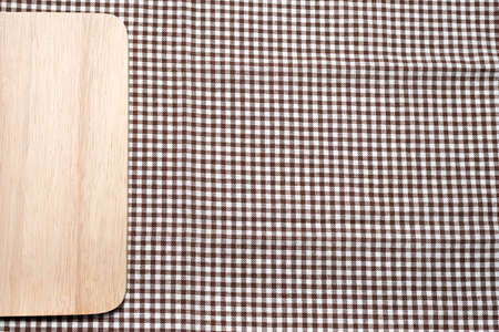 cutting board on kitchen towel backgroundの写真素材