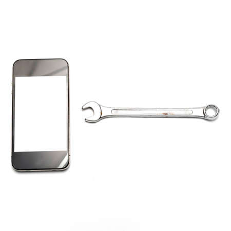 smart phone with wrench isolated on white backgroundの写真素材