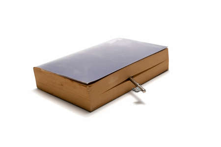 book and key isolated on white backgroundの写真素材