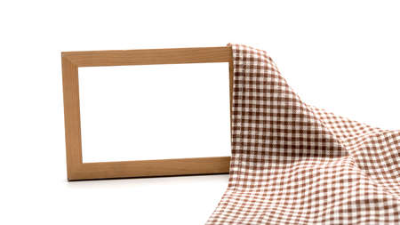 photo frame and kitchen towel isolated on white backgroundの写真素材