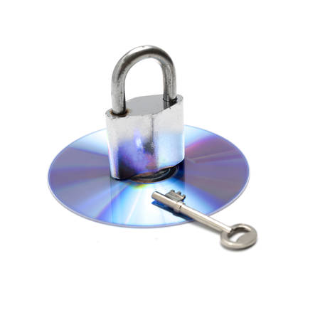 padlock on dvd dish isolated on white backgroundの写真素材