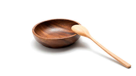 wood bowl and spoon isolated on white backgroundの写真素材