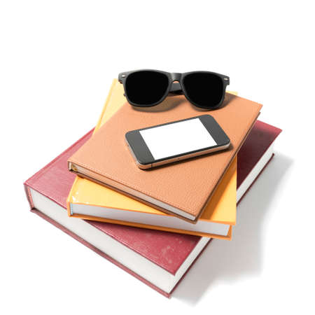 sunglasses smartphone and stack of book isolated on white backgroundの写真素材