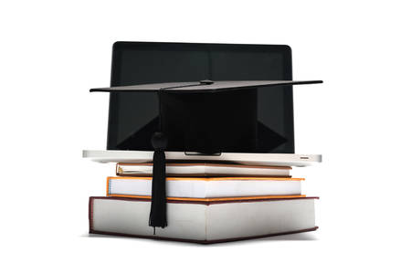 graduation cap and book with laptop isolated on white backgroundの写真素材