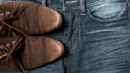 leather shoes on jean pantの写真素材