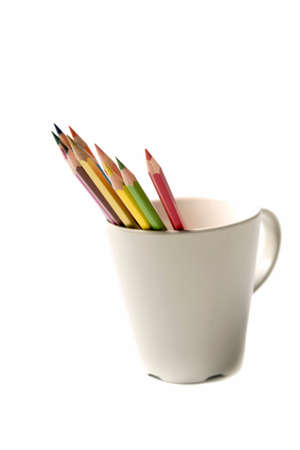 colorful pencil in mug isolated on white backgroundの写真素材
