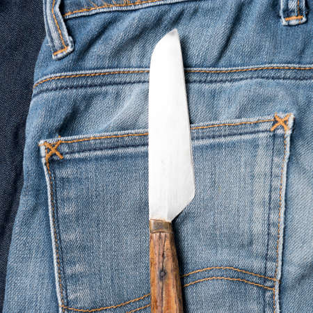 knife in jeanの写真素材