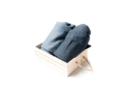 jean in wood box isolated on white backgroundの写真素材