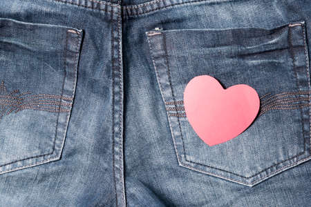 red heart on jeanの写真素材