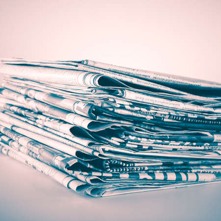 black and white stack of newspaper vintage styleの写真素材