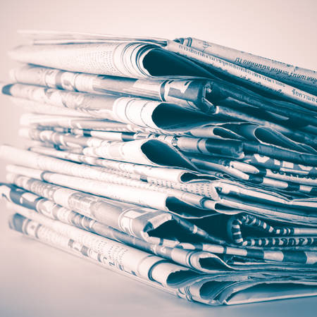 black and white stack of newspaper vintage style