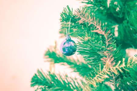 close up blue christmas ball on tree vintage style
