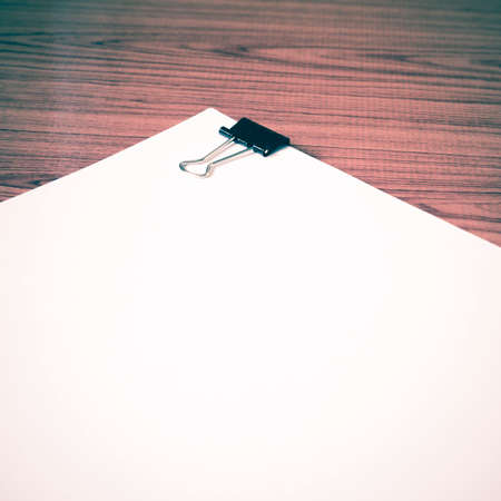 white paper on wood background vintage styleの写真素材