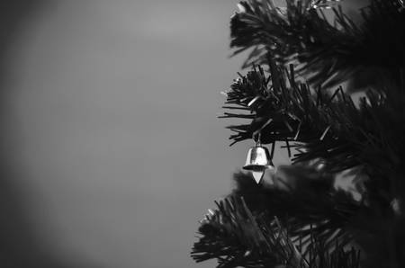 close up small bell on christmas tree black and white color tone styleの写真素材