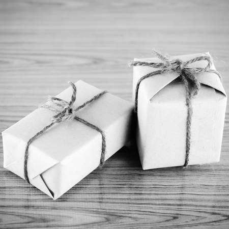 gift box on wooden black and white color tone styleの写真素材