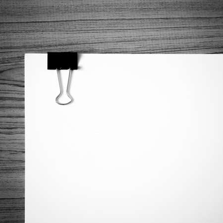 white paper on wood black and white color tone styleの写真素材