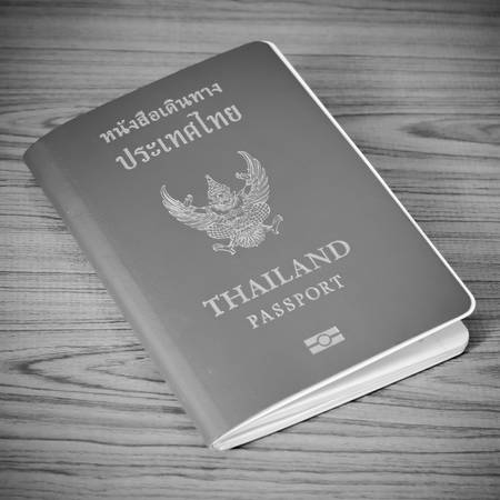 Thai passport on wood table black and white color tone styleの写真素材