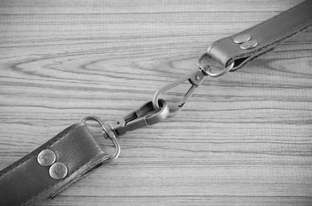 bag leather strap on wood black and white color tone styleの写真素材