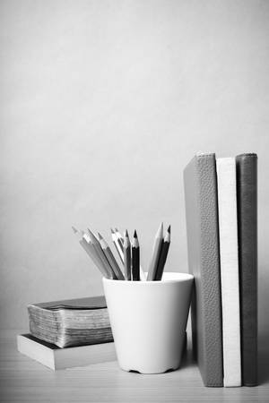 book and color pencil on wood black and white color tone styleの写真素材