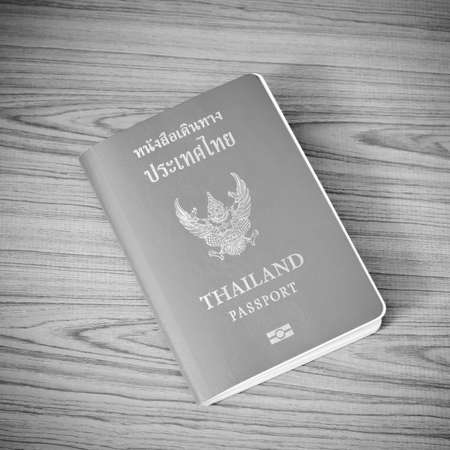 Thai passport on wood table black and white color tone styleの写真素材