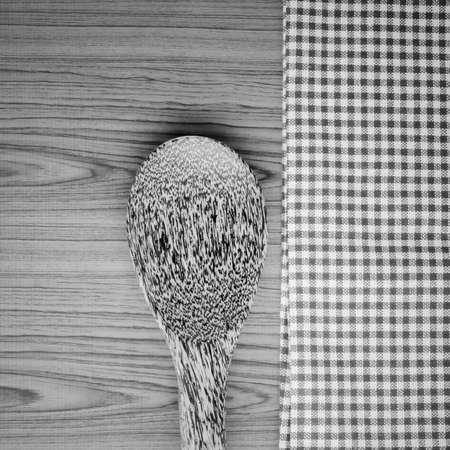 Brown kitchen towel with spoon on wood black and white color tone styleの写真素材