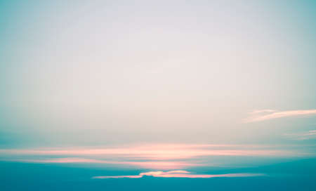 nature background blue sky with sun set blurry vintage styleの写真素材