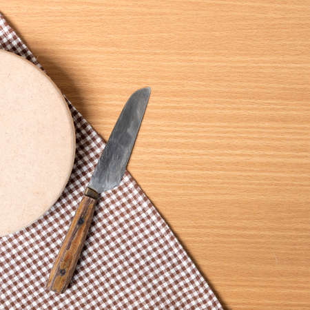 knife and cutting board on table