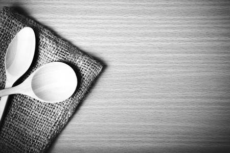 wooden spoon on table black and white color tone styleの写真素材