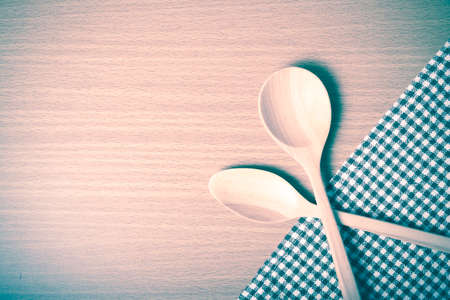 wood spoon and kitchen towel on table vintage styleの写真素材