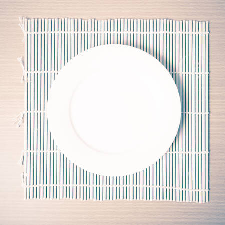 empty dish on mat vintage styleの写真素材