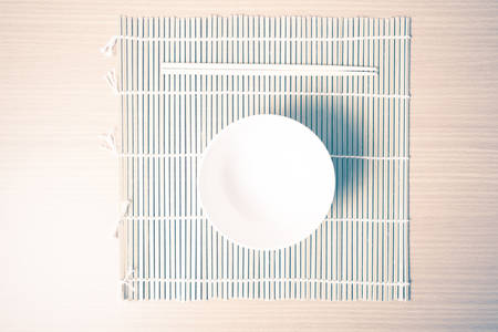 empty bowl on mat vintage styleの写真素材