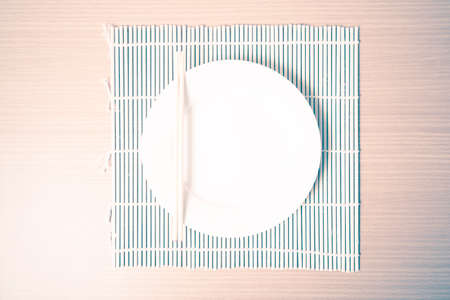 empty dish on mat vintage styleの写真素材
