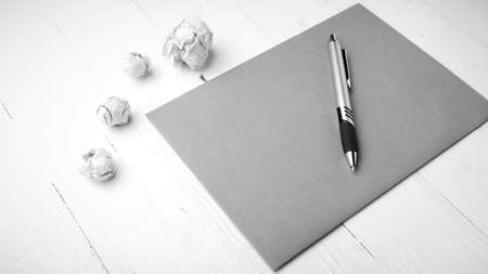 brown paper and crumpled on white table black and white tone color styleの写真素材