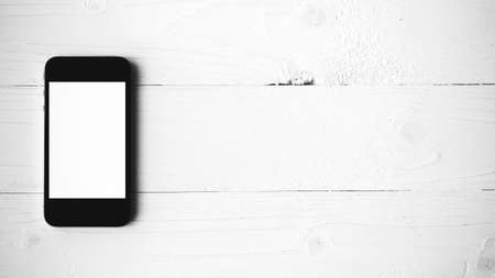 cellphone on white table black and white color styleの写真素材
