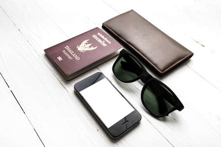 travel gadget over white tableの写真素材