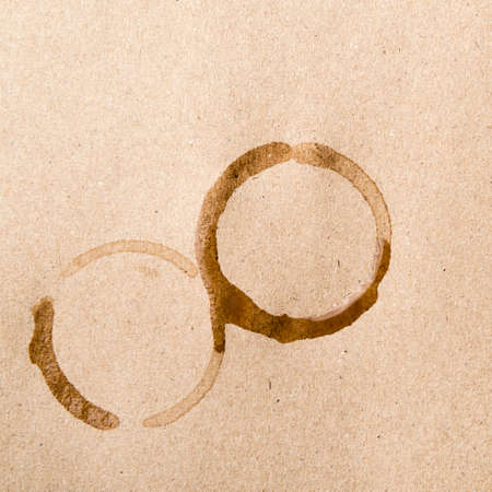 coffee cup stain over brown backgroundの写真素材