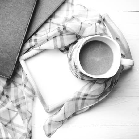 coffee and scarf background on white table black and white colorの写真素材