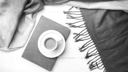 coffee and scarf background on white table black and white colorの写真素材