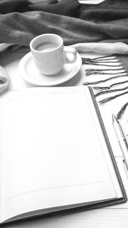 coffee and scarf background on white table black and white color