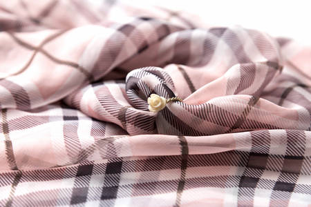 ring on scarf backgroundの写真素材