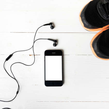 fitness equipment:running shoes,smartphoneの写真素材