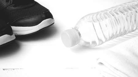 fitness equipment:running shoes,water bottle,towel black and white color styleの写真素材